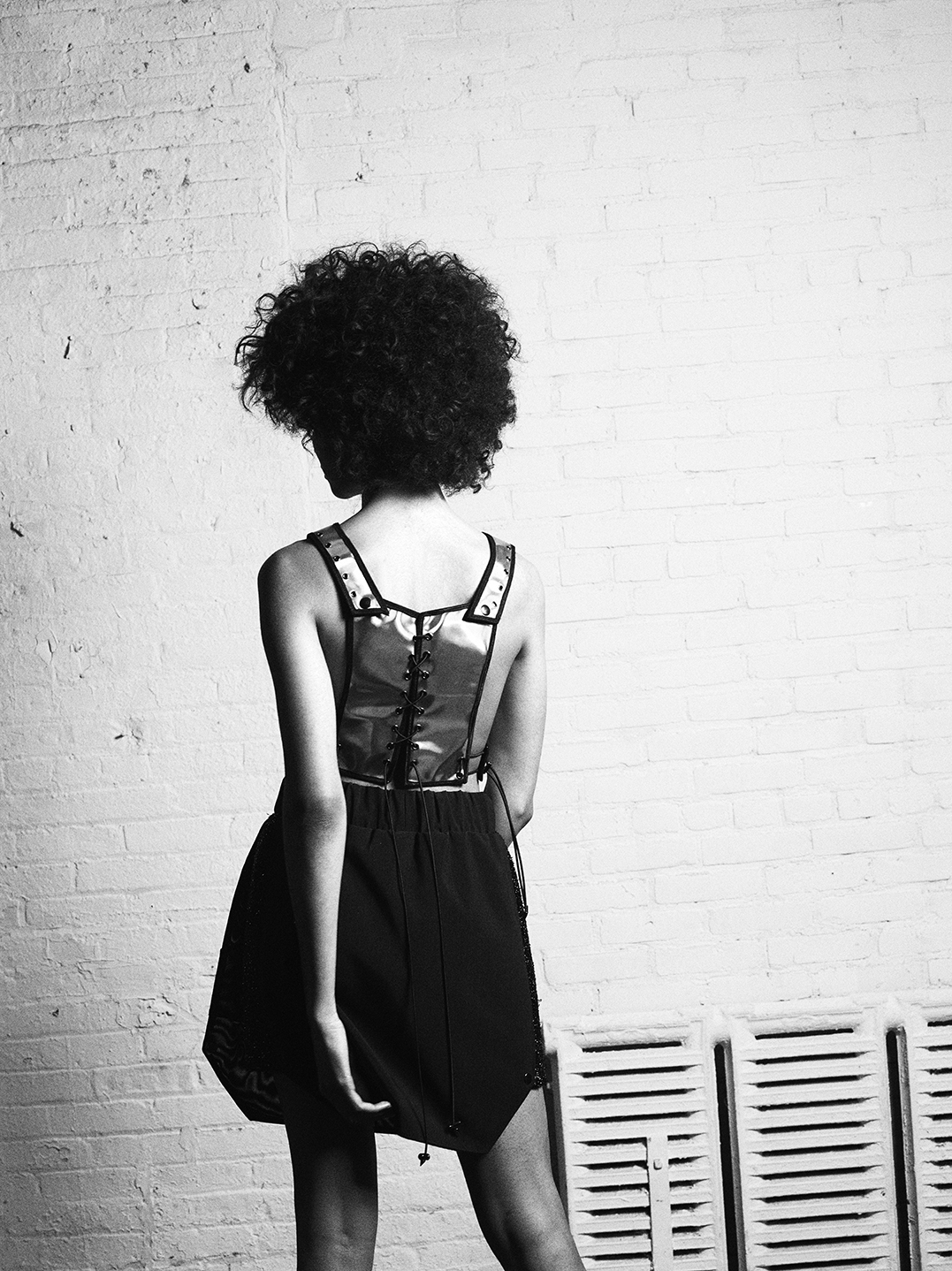 Black and White image of girl with 2-piece reflective suit